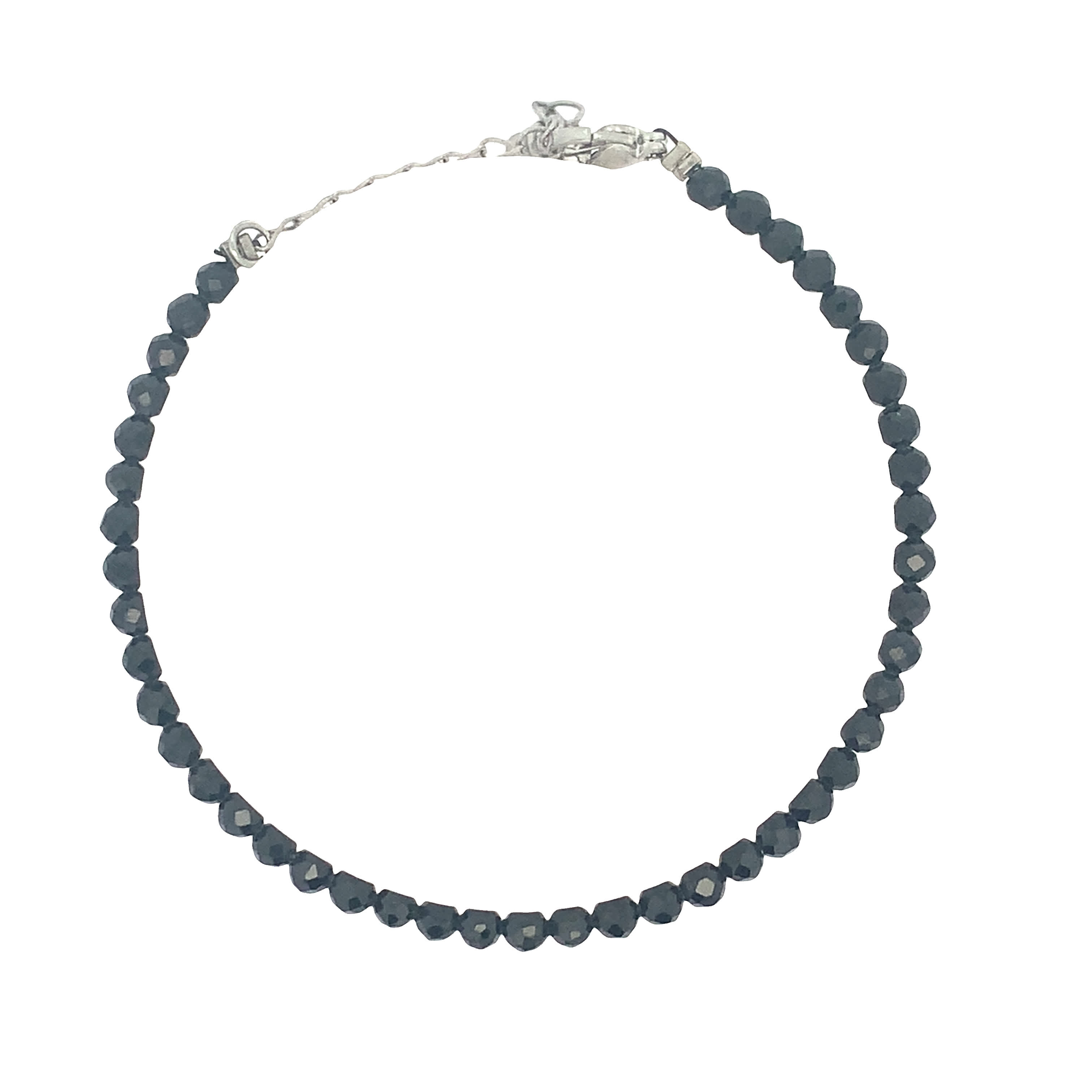 Elegancka bransoletka z niebieskimi kryształkami i srebrnymi koralikami