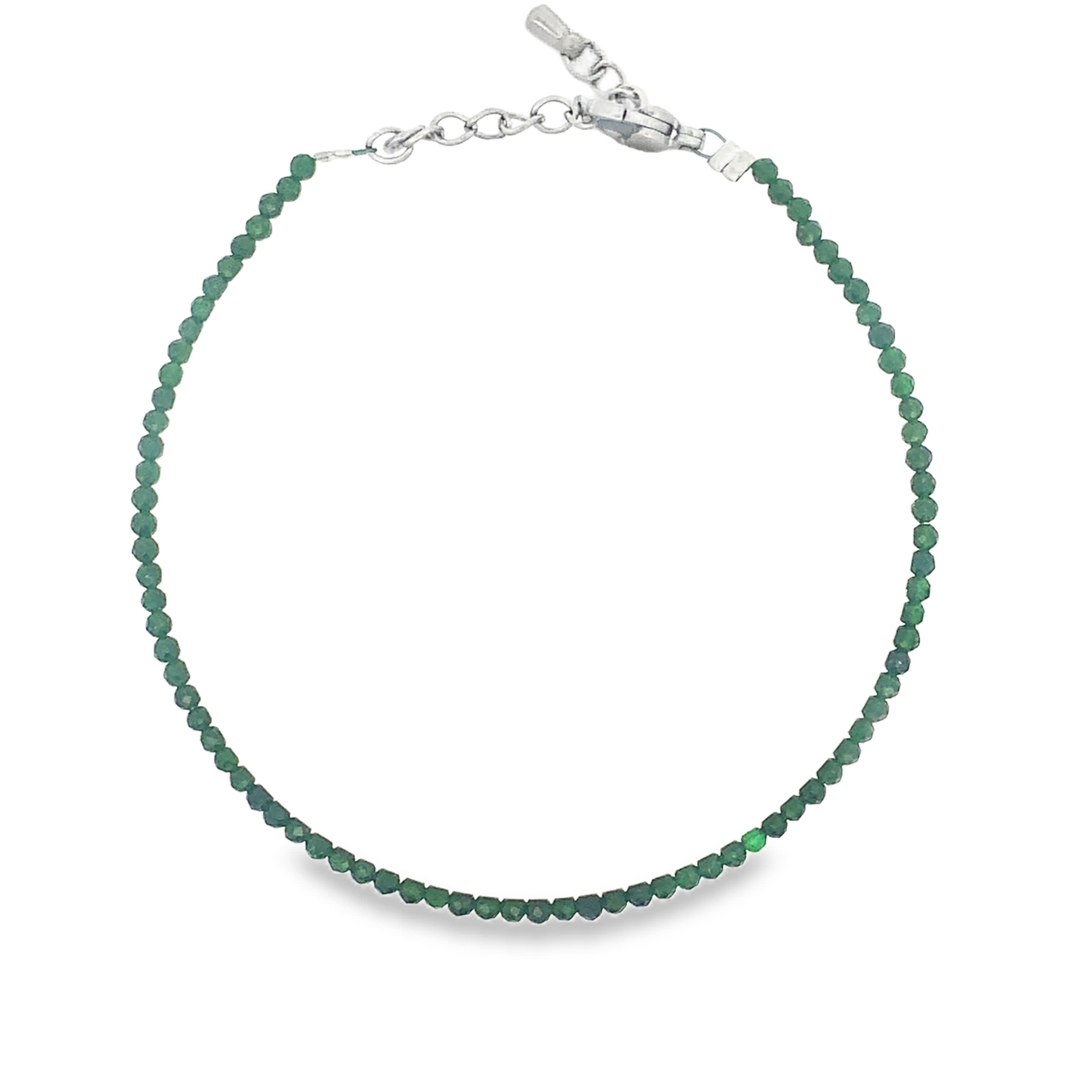 Bransoletka łańcuszkowa ze srebrzonej stali  z okrągłymi koralikami