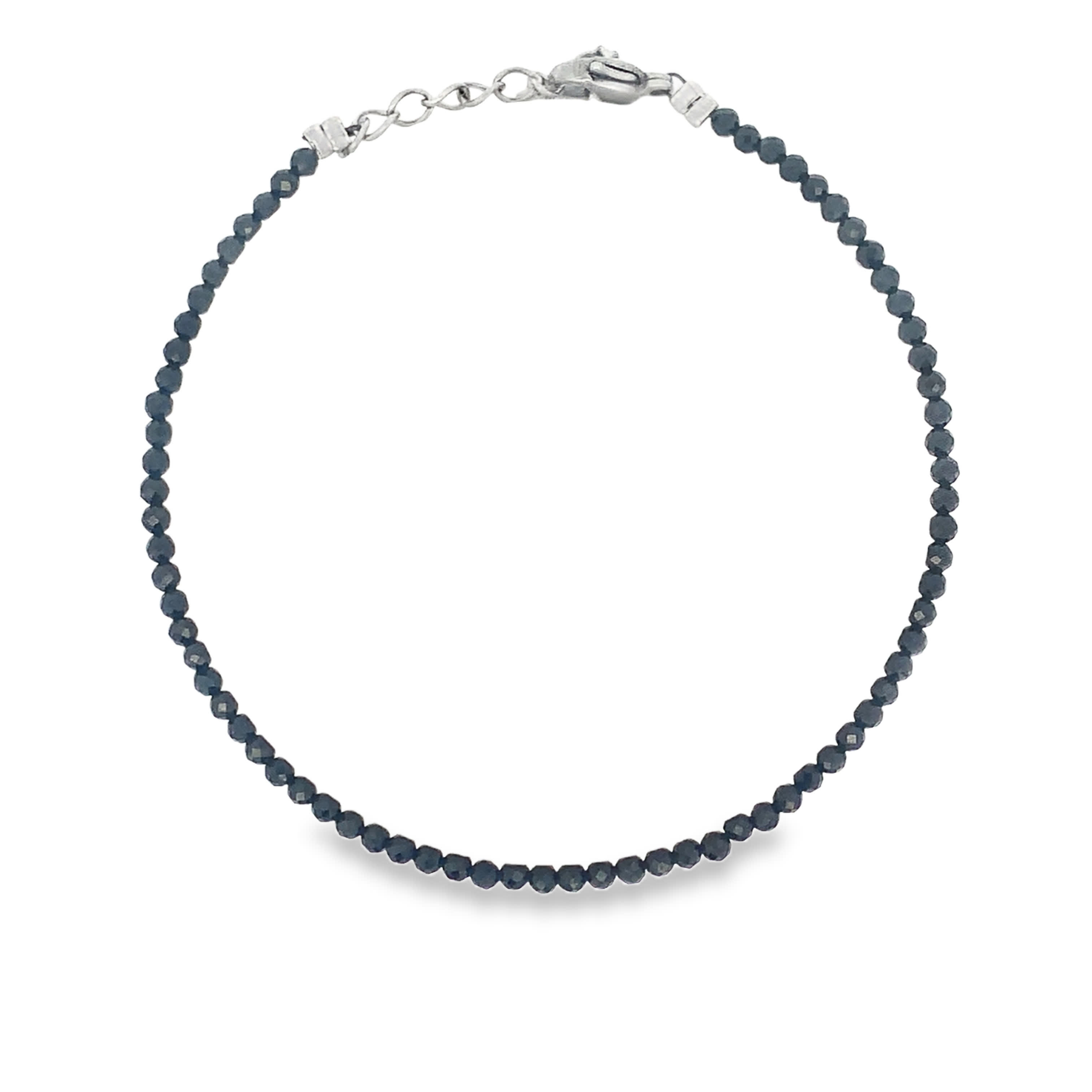 Bransoletka z koralików ze srebrzonej stali platerowanego białym kamieniem