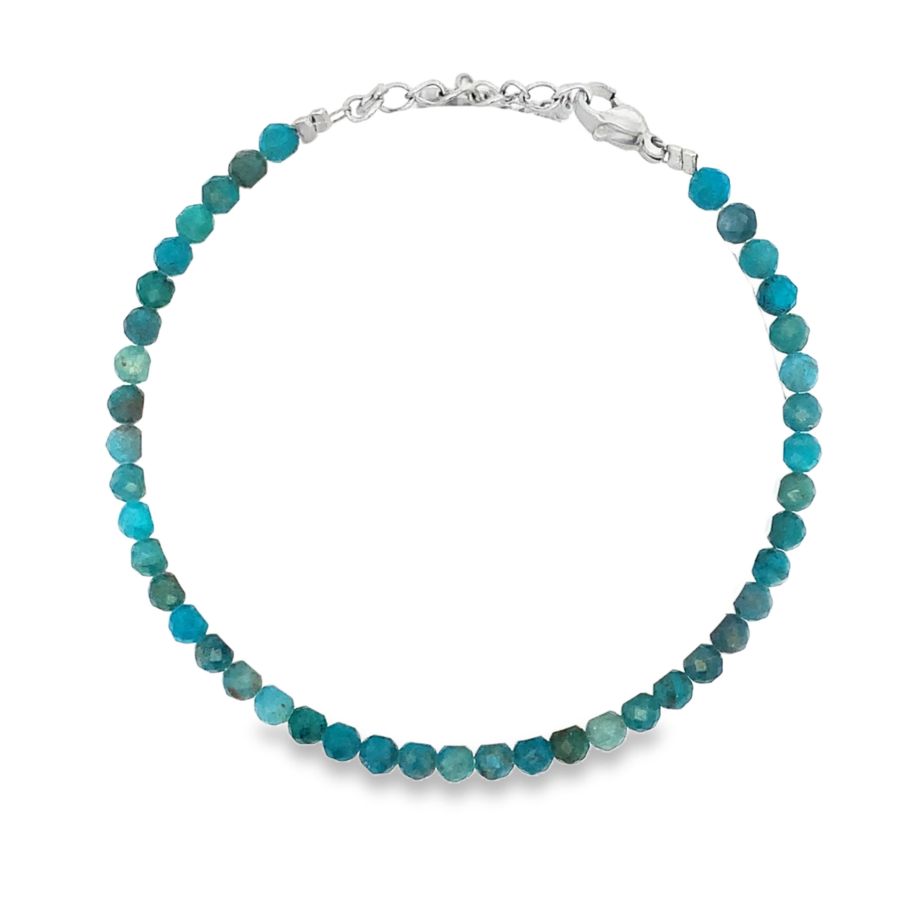 Bransoletka z koralików ze srebrzonej stali  z okrągłymi turkusowymi kamieniami