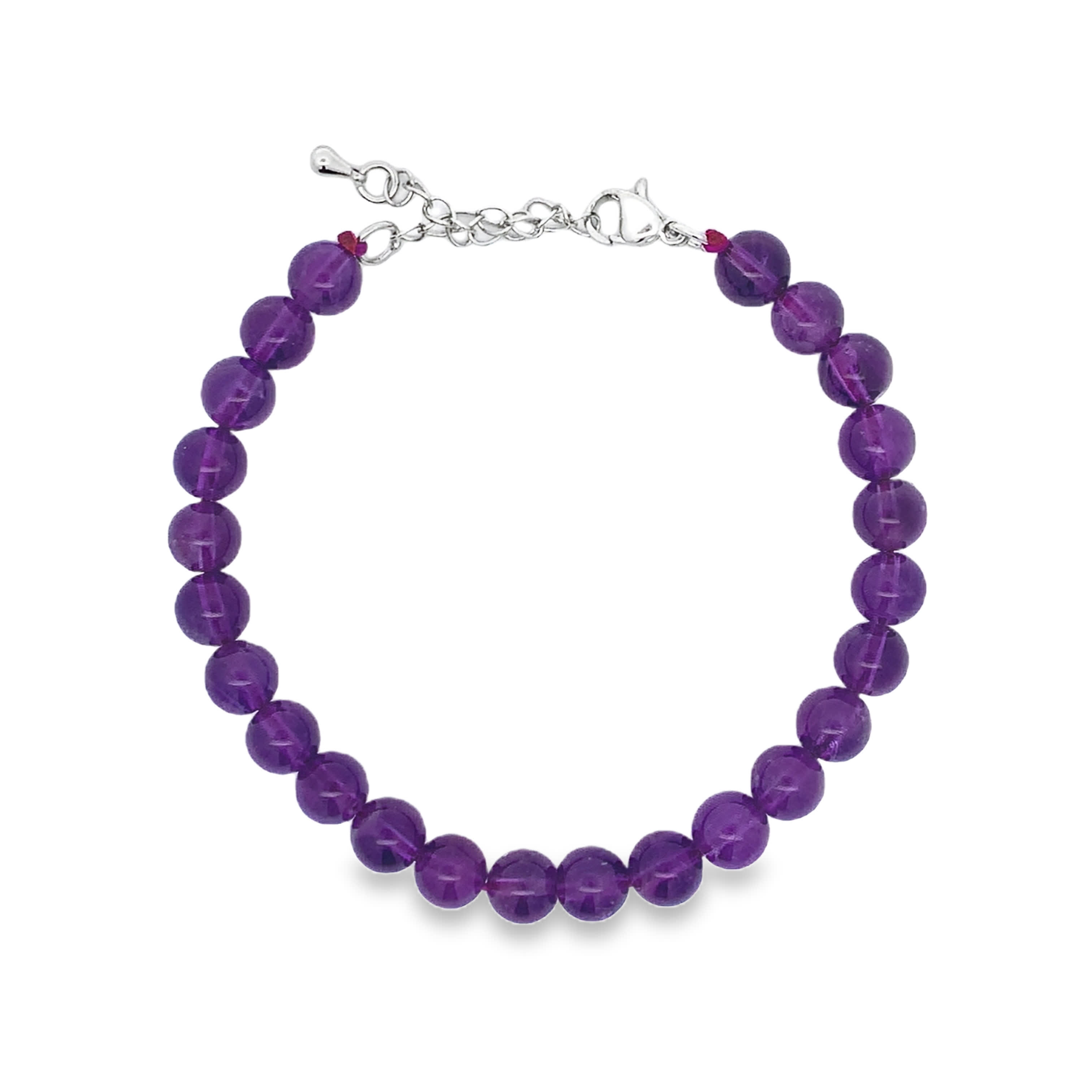 Bransoletka koralikowa z posrebrzanego metalu z okrągłym kaboszonowym ametystem