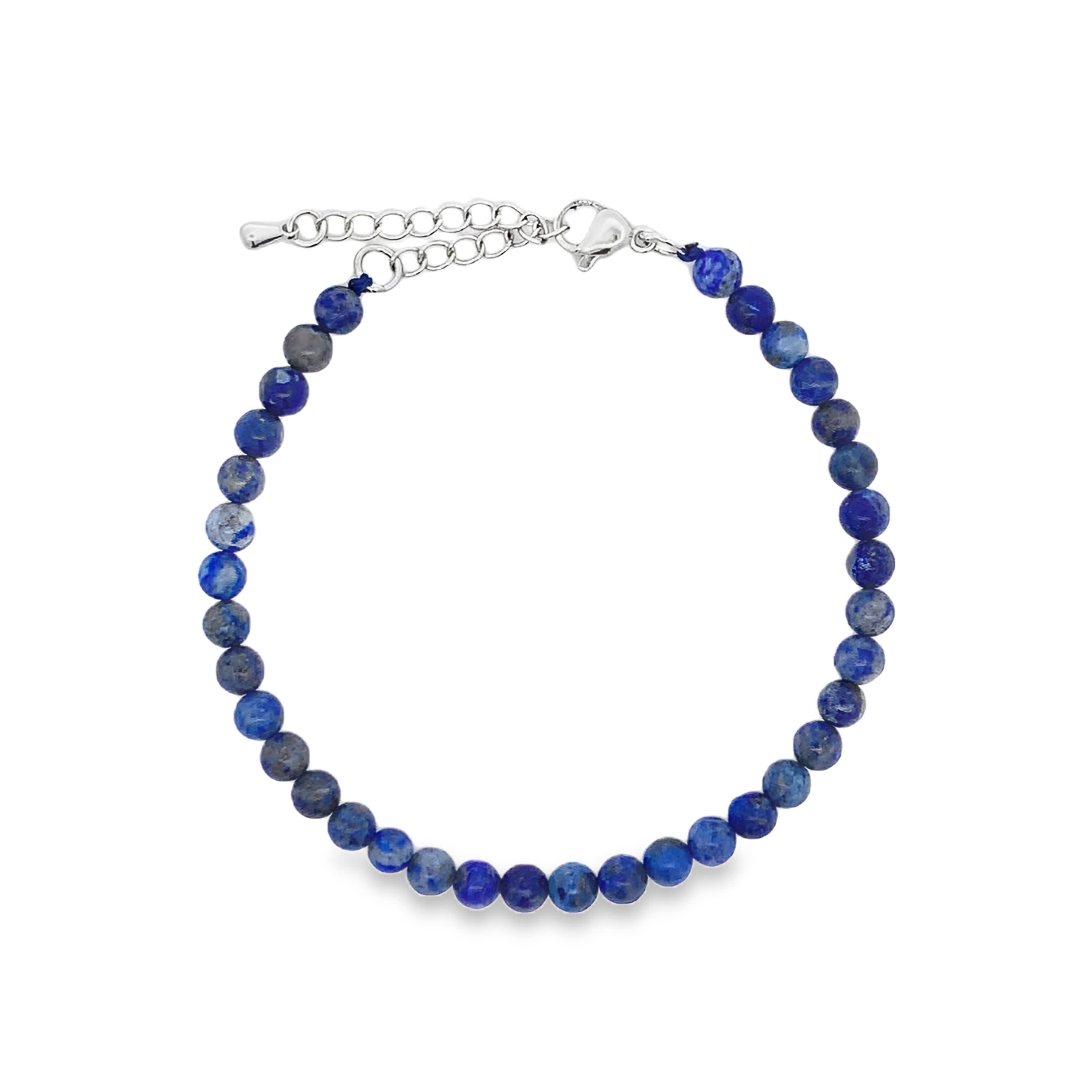 Bransoletka koralikowa z posrebrzanego metalu z kaboszonami lapis lazuli