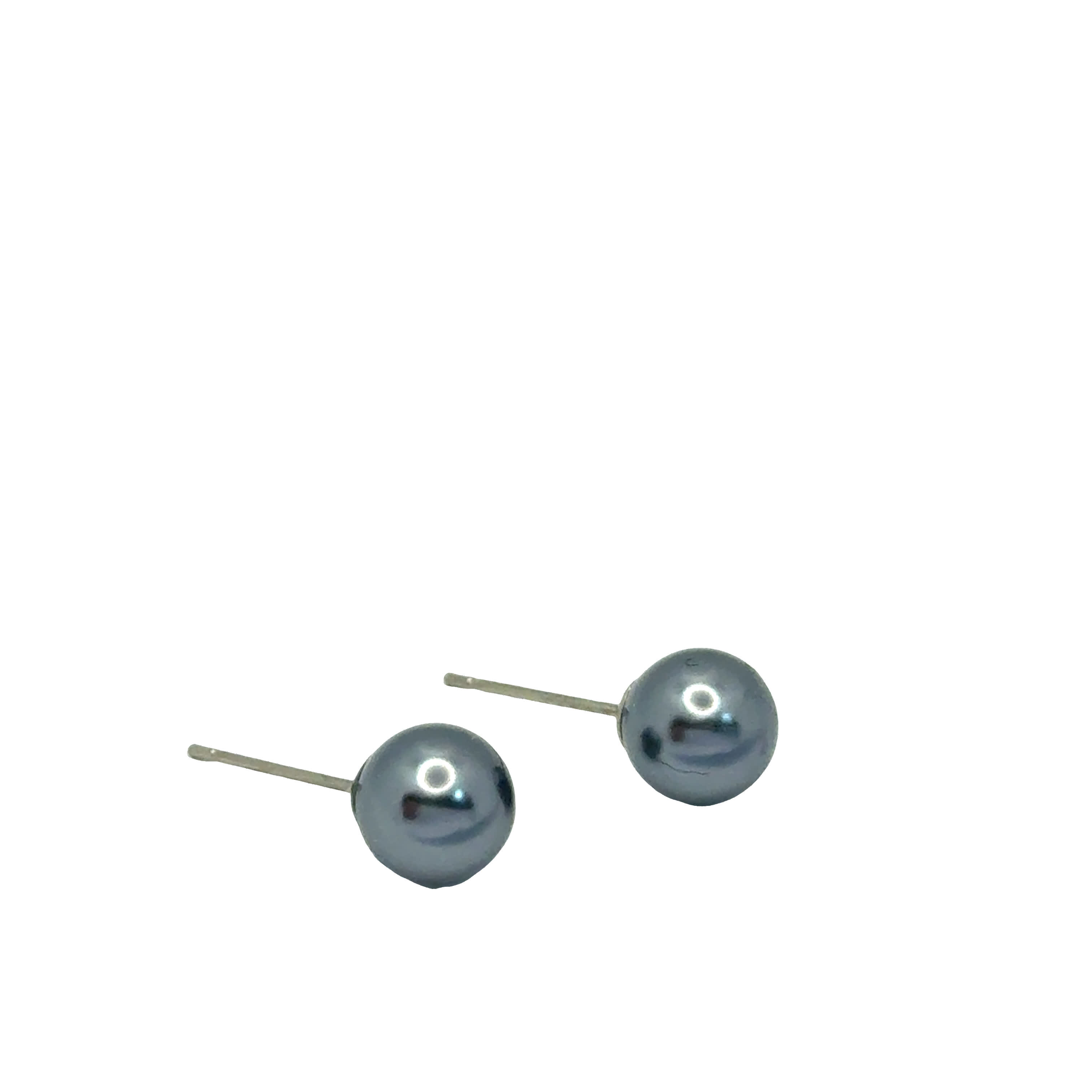 Kolczyki ze srebrzonej stali i białego złocona z okrągłymi fioletowymi perłami