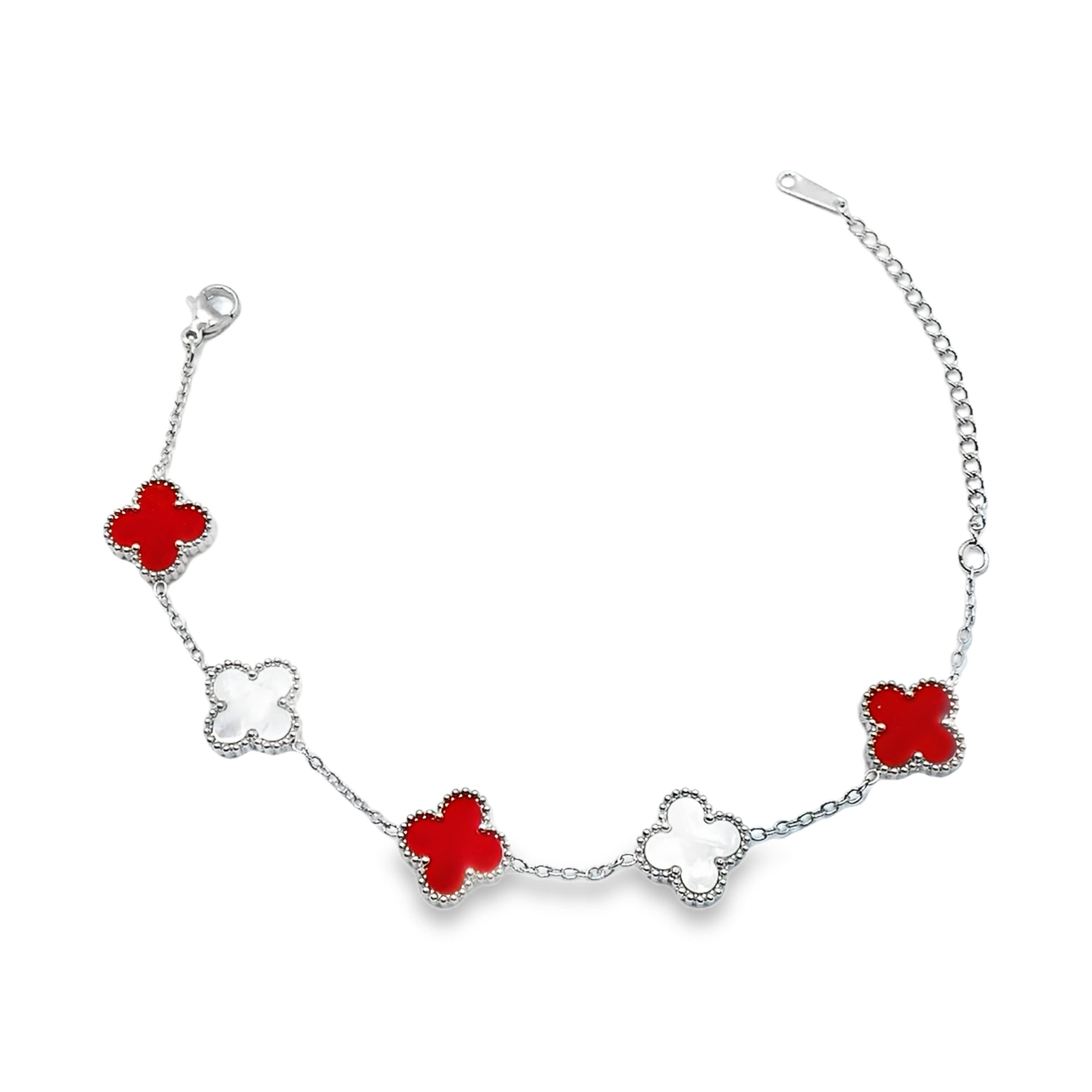 Elegancka srebrna bransoletka łańcuszkowa z zawieszkami koniczyny