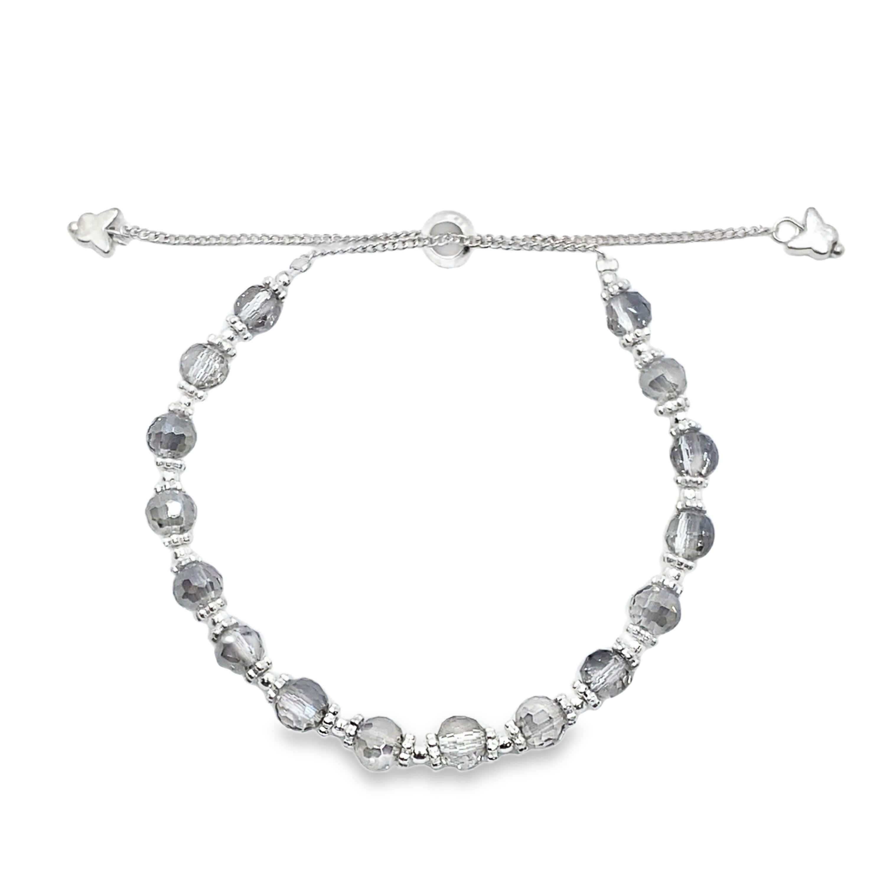 Elegancka srebrna bransoletka z koralikami i fasetowanymi kryształkami