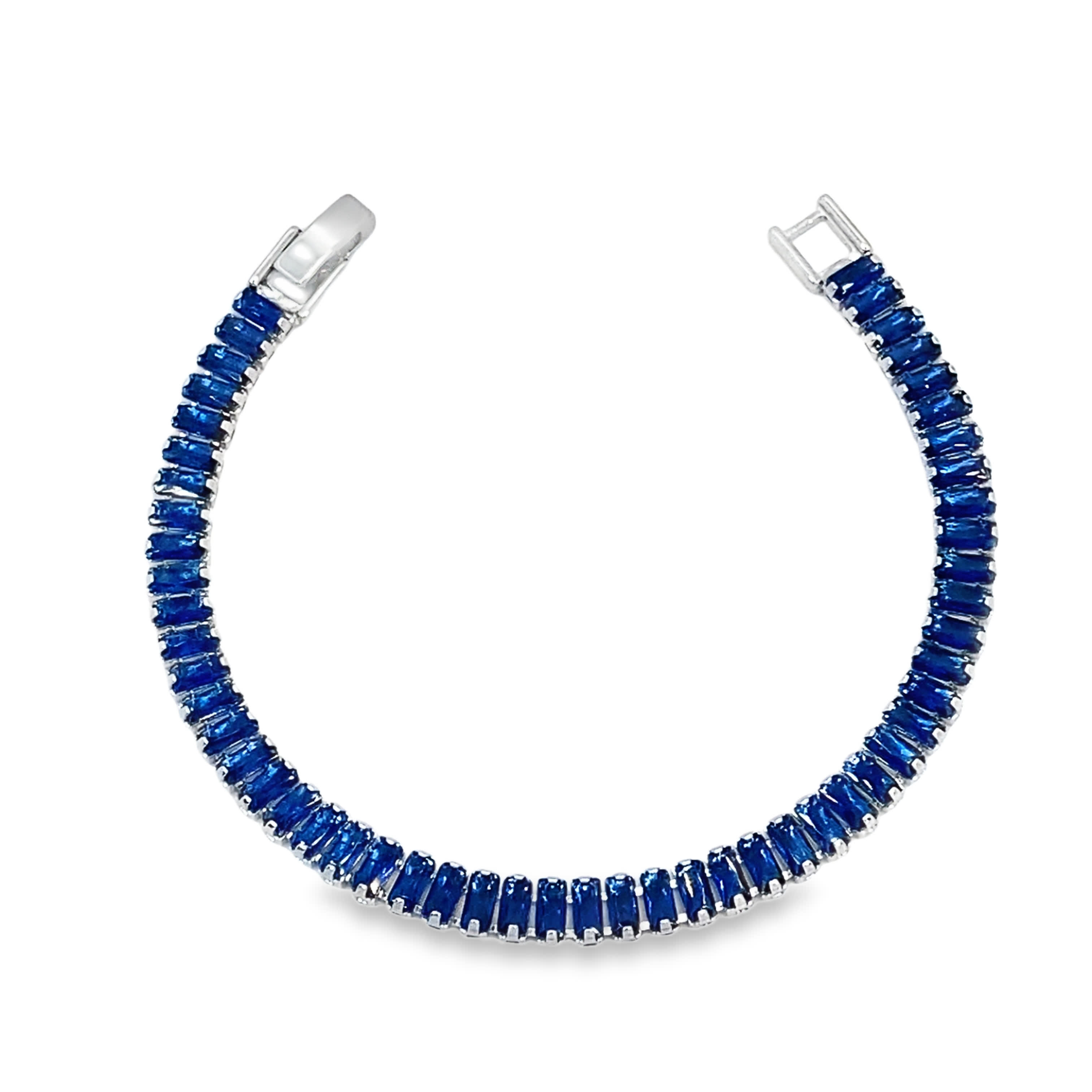 Bransoletka tenisowa z głębokim niebieskim szafirem i szlifem szmaragdowym w białym złocie na srebrze