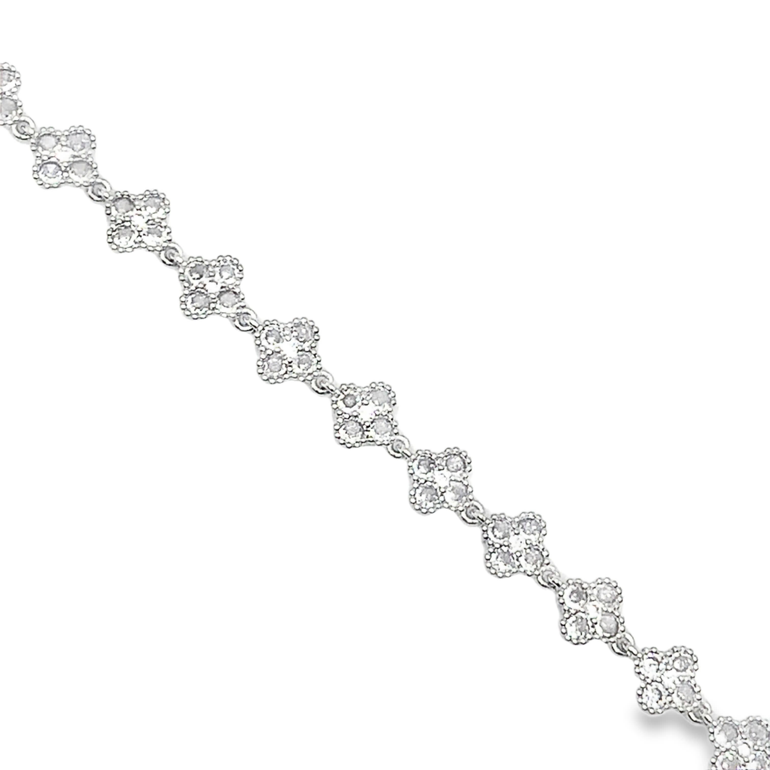 Bransoletka z białego złota i srebra z łańcuszkiem diamentowym