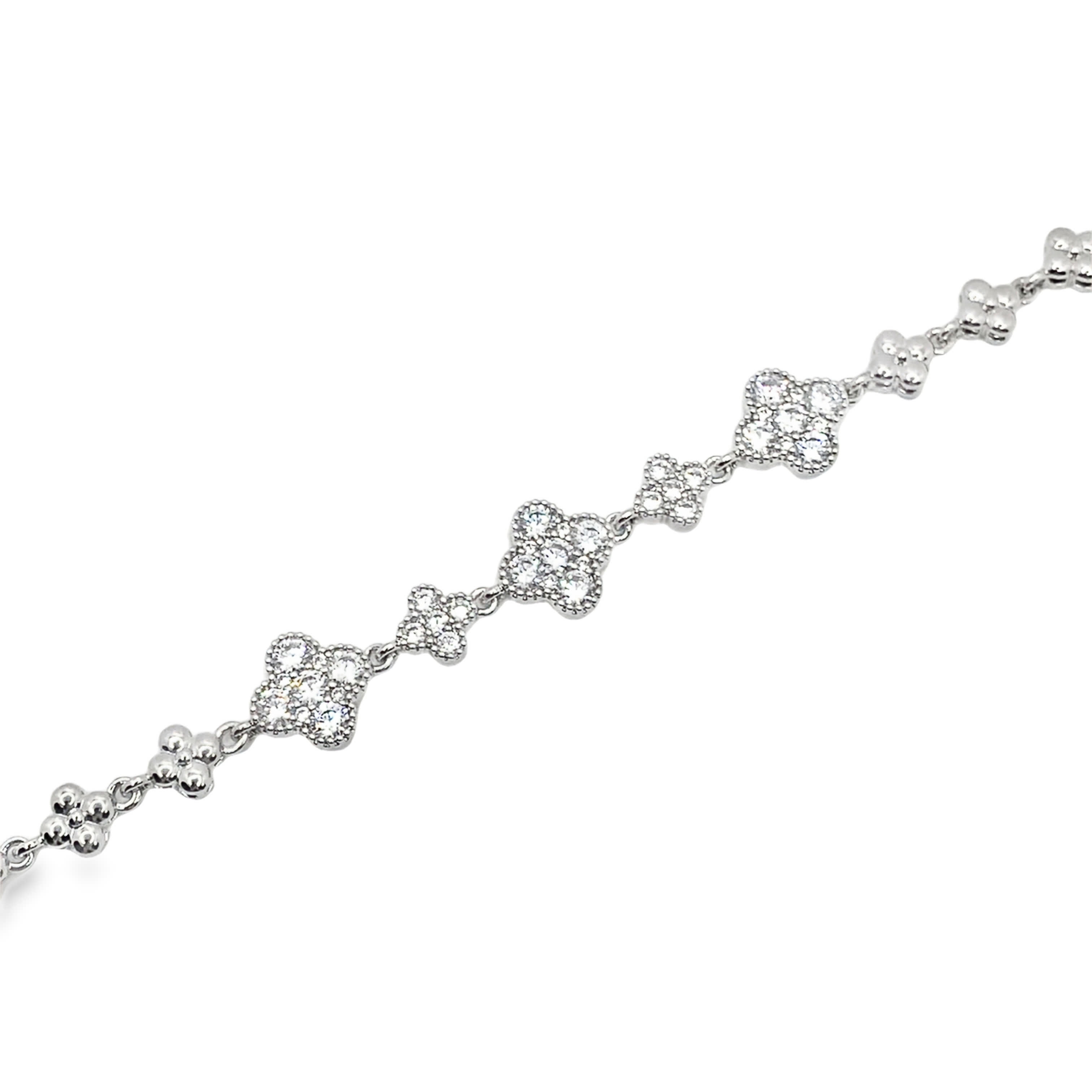 Elegancka bransoletka z białego złota z okrągłymi diamentami