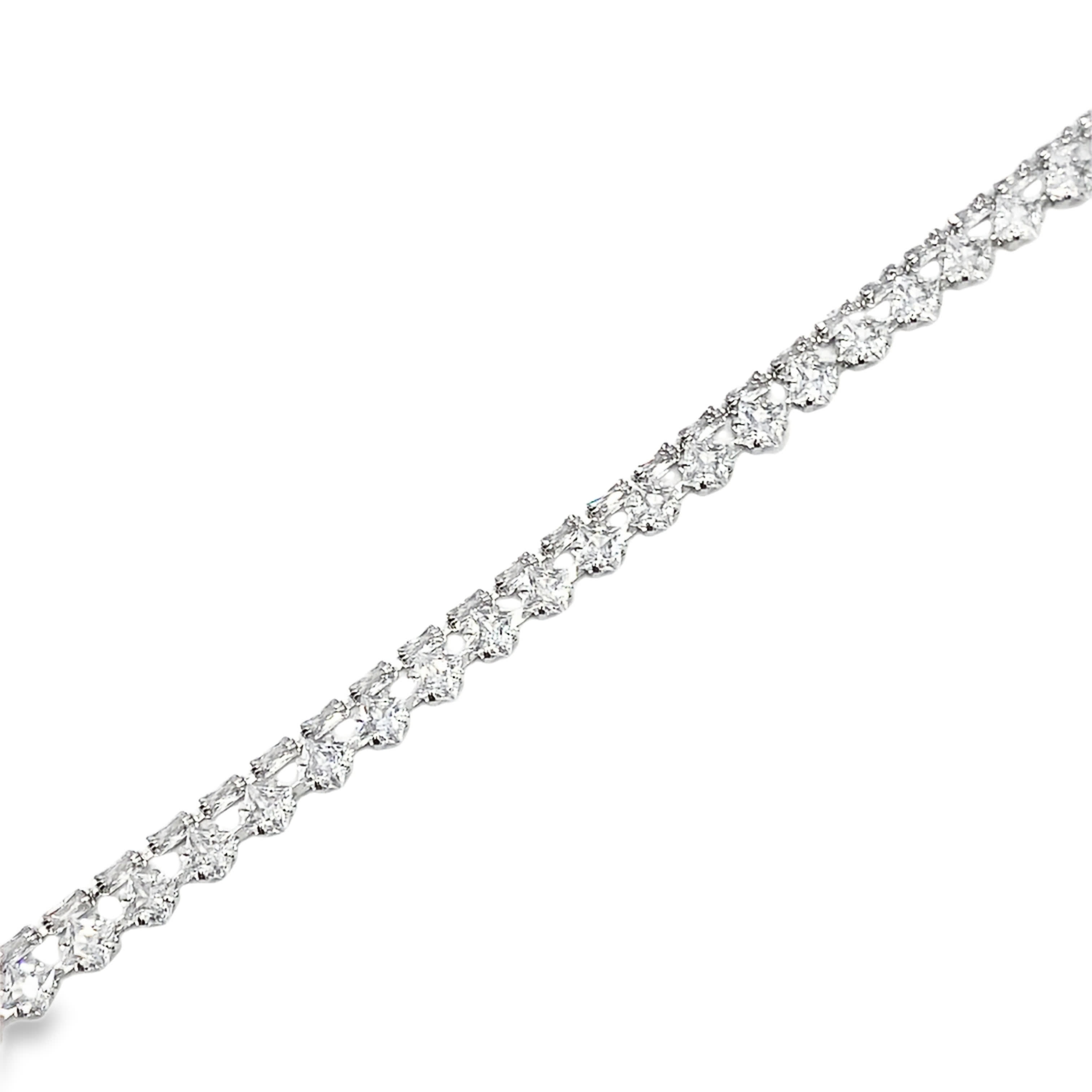 Bransoletka tenisowa z białego złota z diamentami w szlifie księżniczki