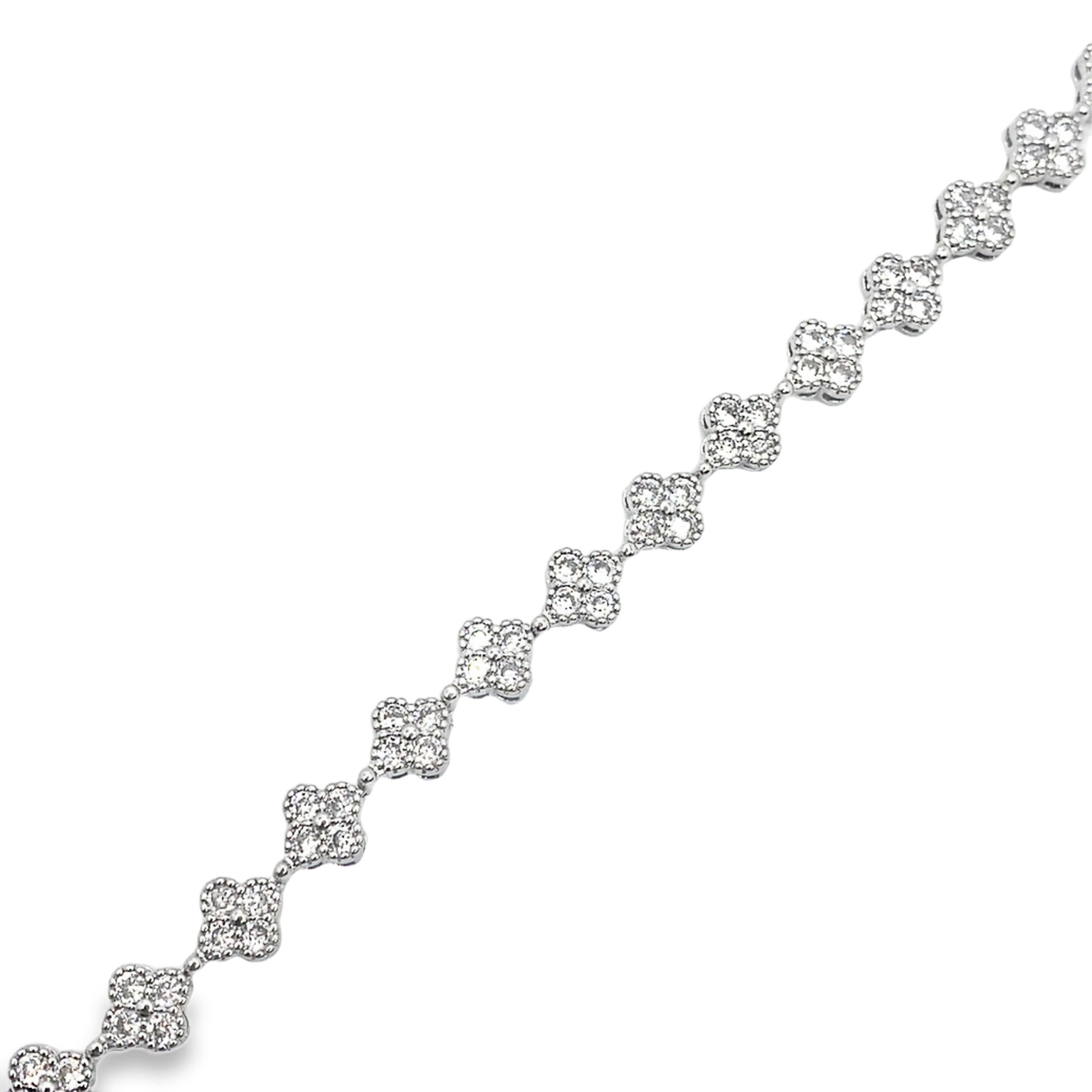 Bransoletka z białego złota z łańcuszkiem i okrągłymi diamentami