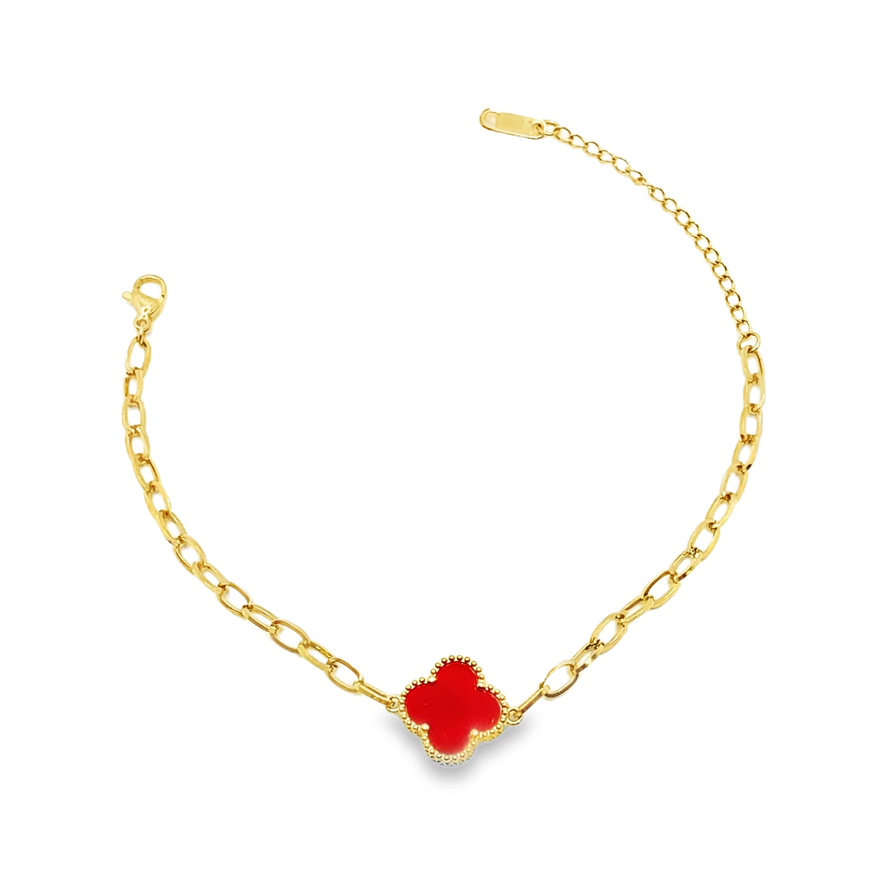 Bransoletka z żółtego złota z zawieszką w kształcie koniczyny czerwonej