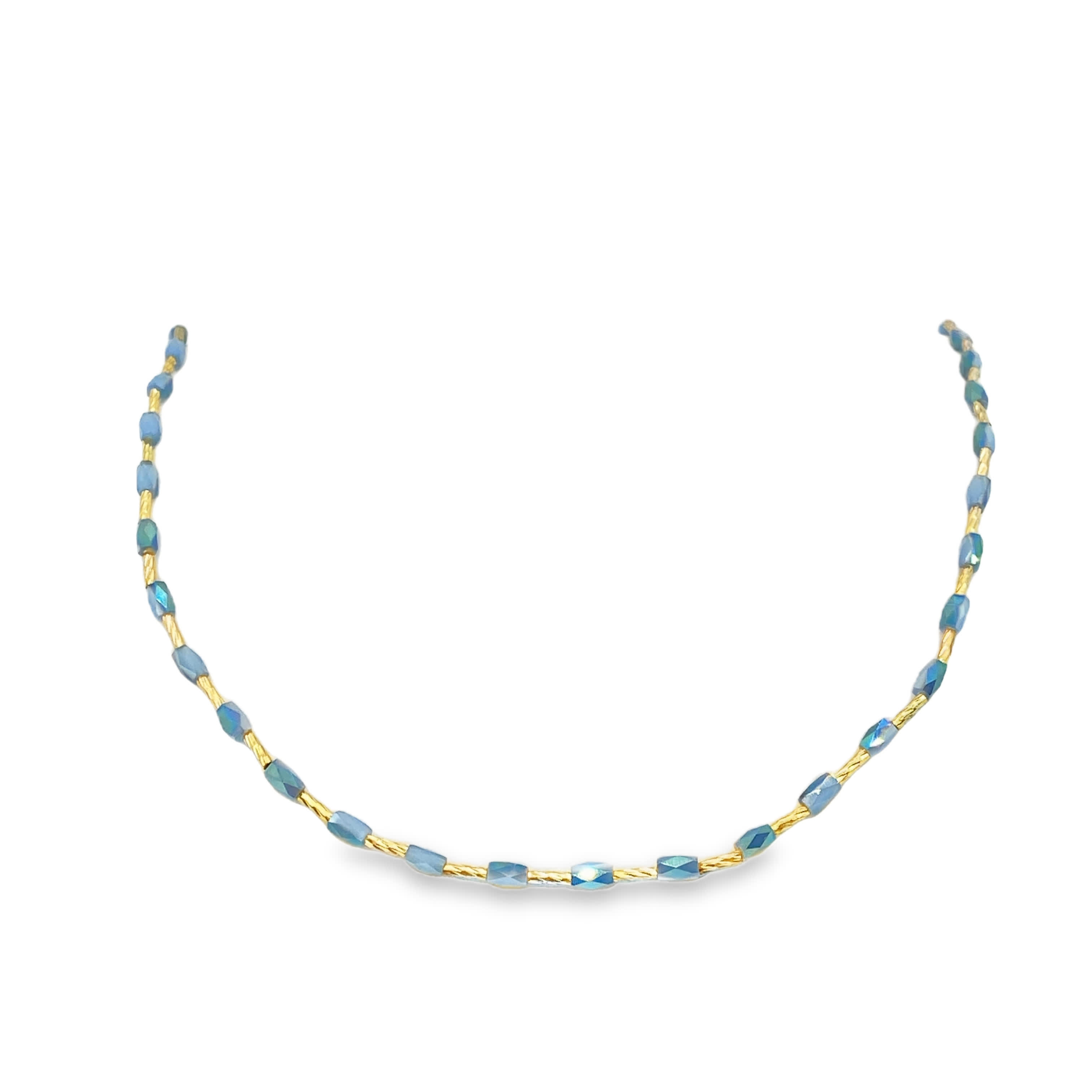 Naszyjnik ze złoconej stali z koralikami i niebieskimi kryształowymi kaboszonami