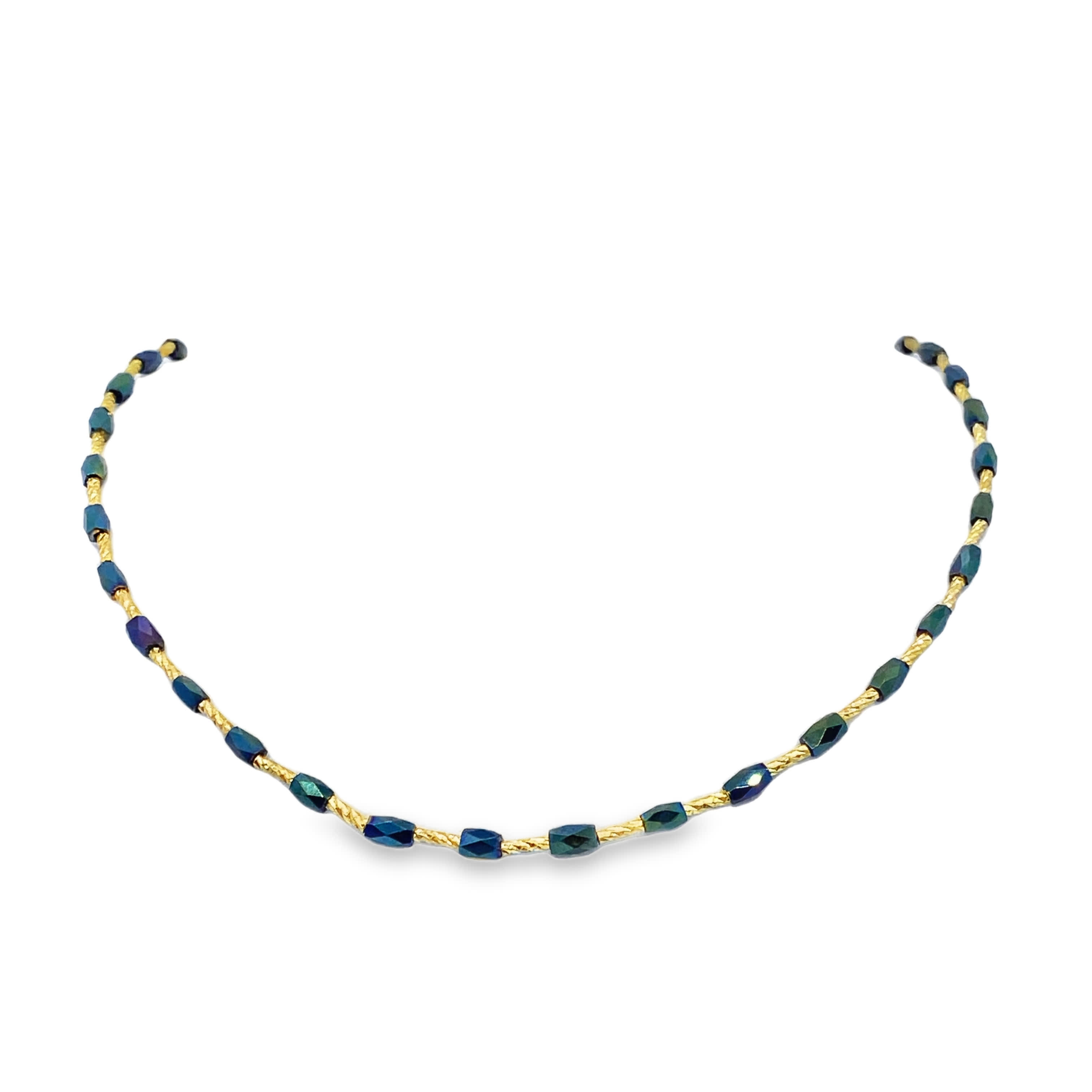 Naszyjnik ze złoconej stali z okrągłymi niebieskimi kryształkami