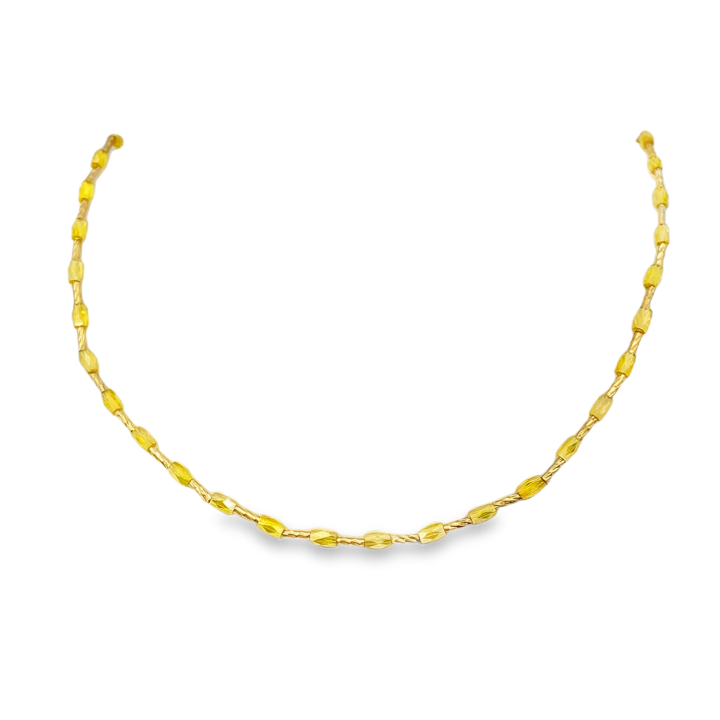 Naszyjnik ze złoconej stali z koralikami i błyszczącymi bursztynowymi kamieniami