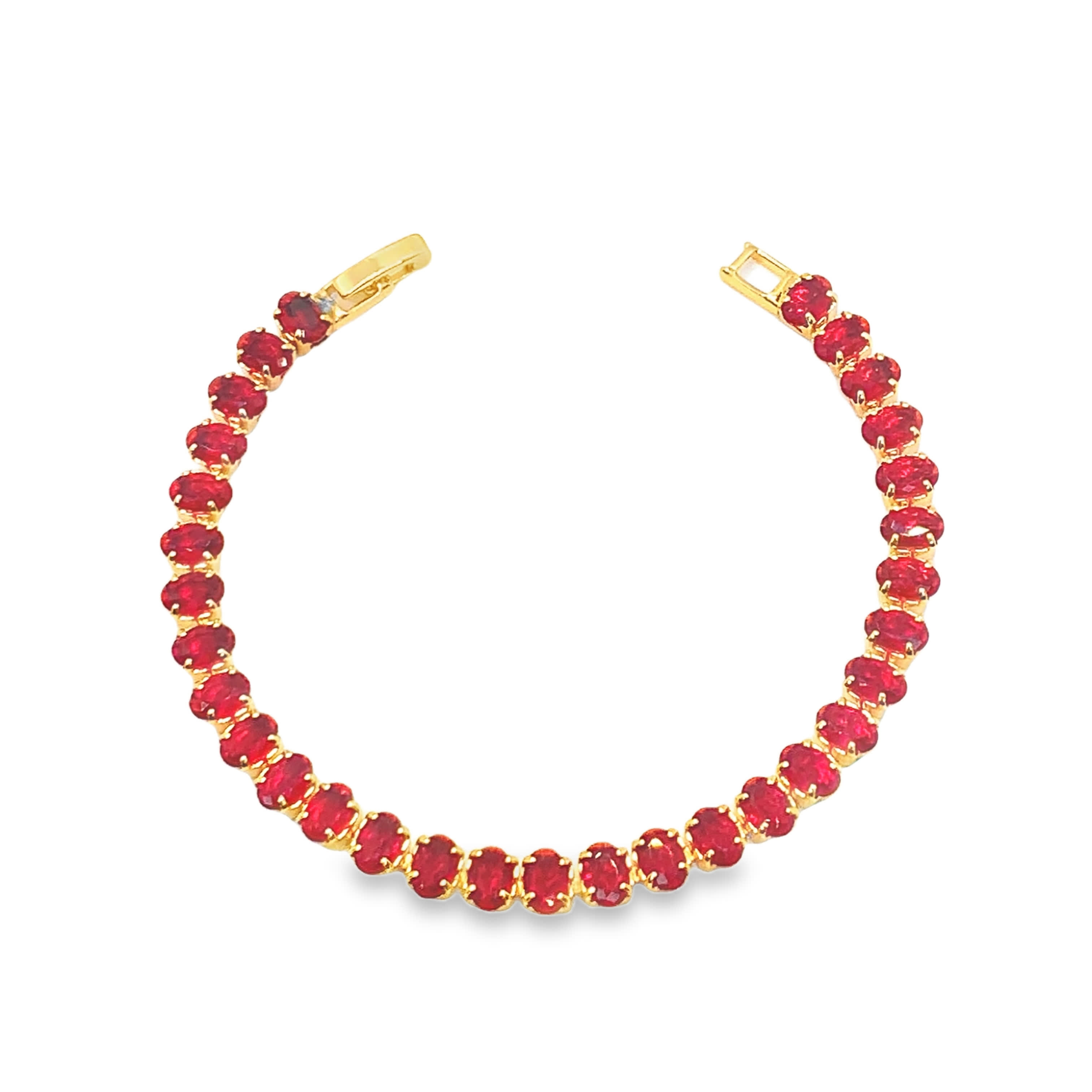Bransoletka tenisowa z żółtego złota z owalnymi kaboszonami rubinowymi