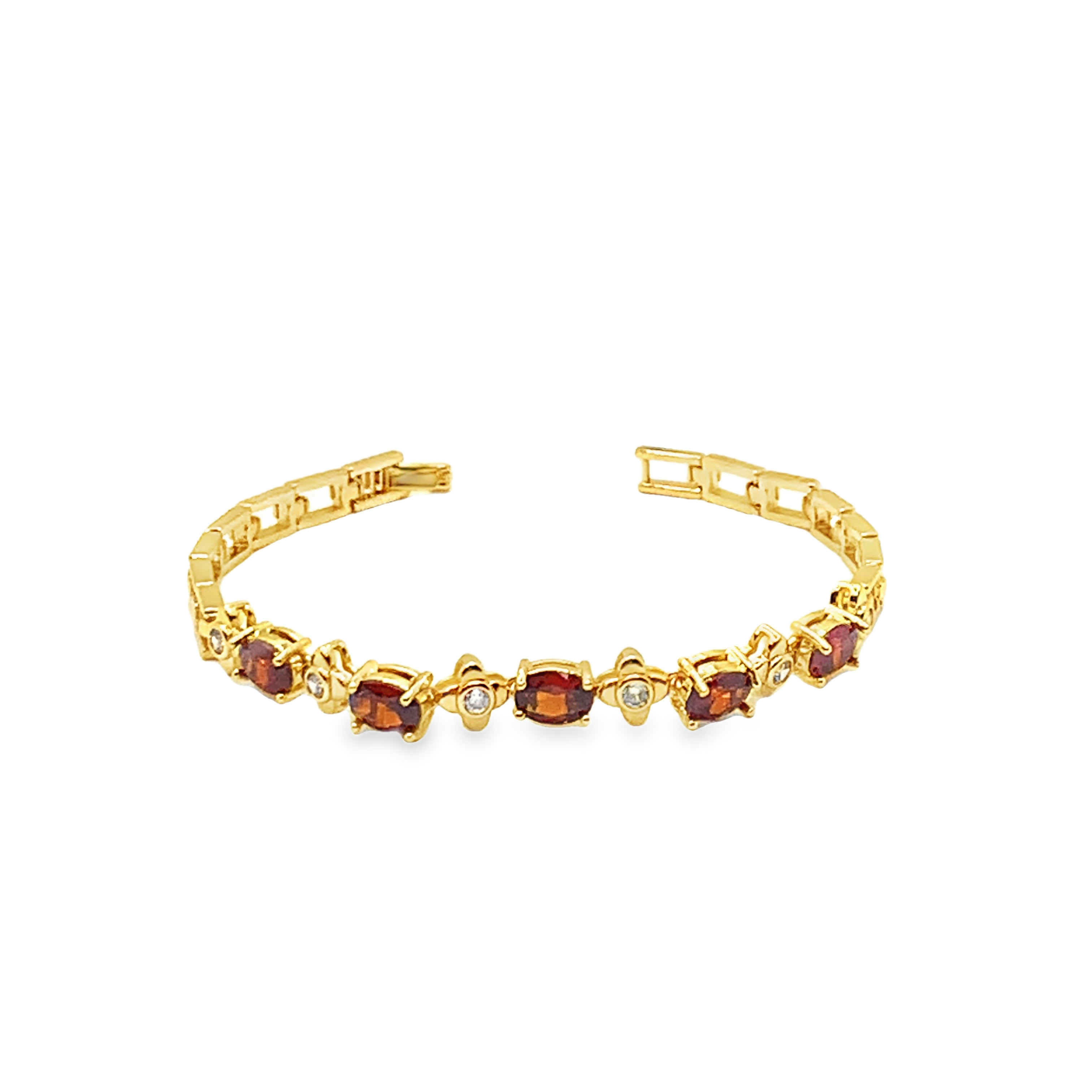 Bransoletka tenisowa z żółtego złota z owalnymi granatami