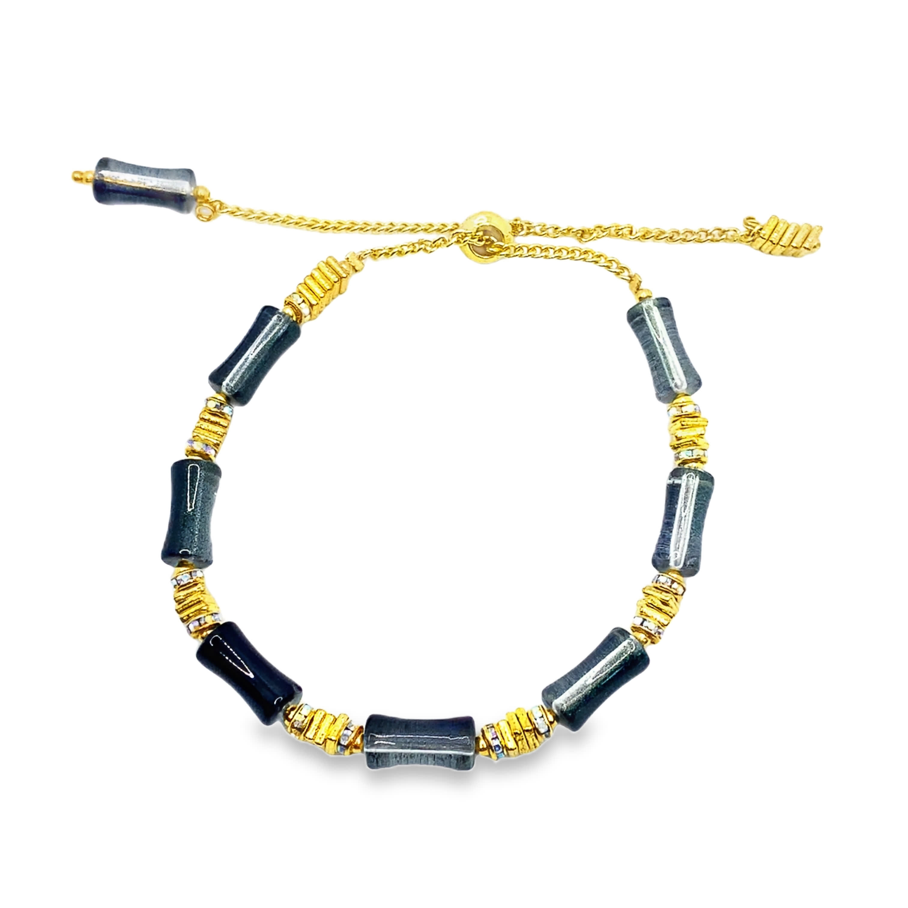 Elegancka bransoletka z koralików z szarego kamienia i żółtego złota