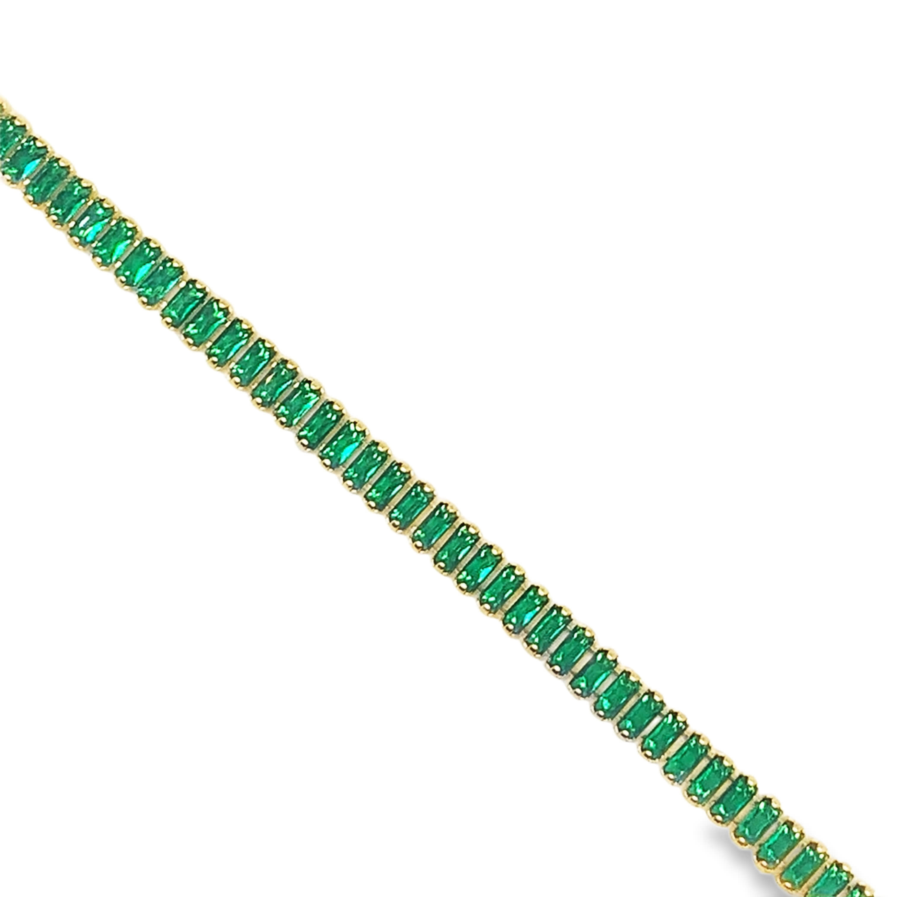 Bransoletka tenisowa z żółtego złota ze szmaragdem