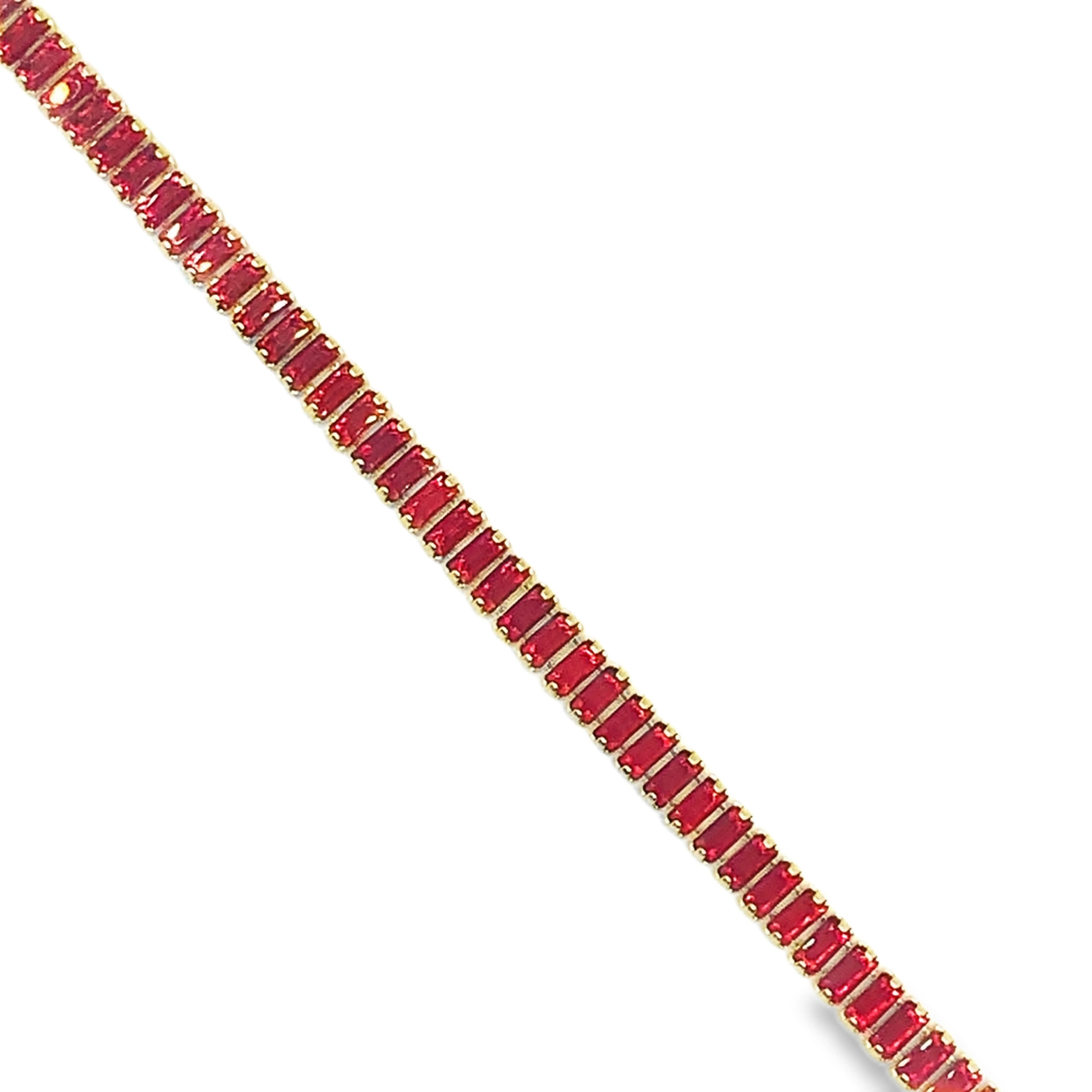 Bransoletka tenisowa z żółtego złota z rubinami o szlifie szmaragdowym