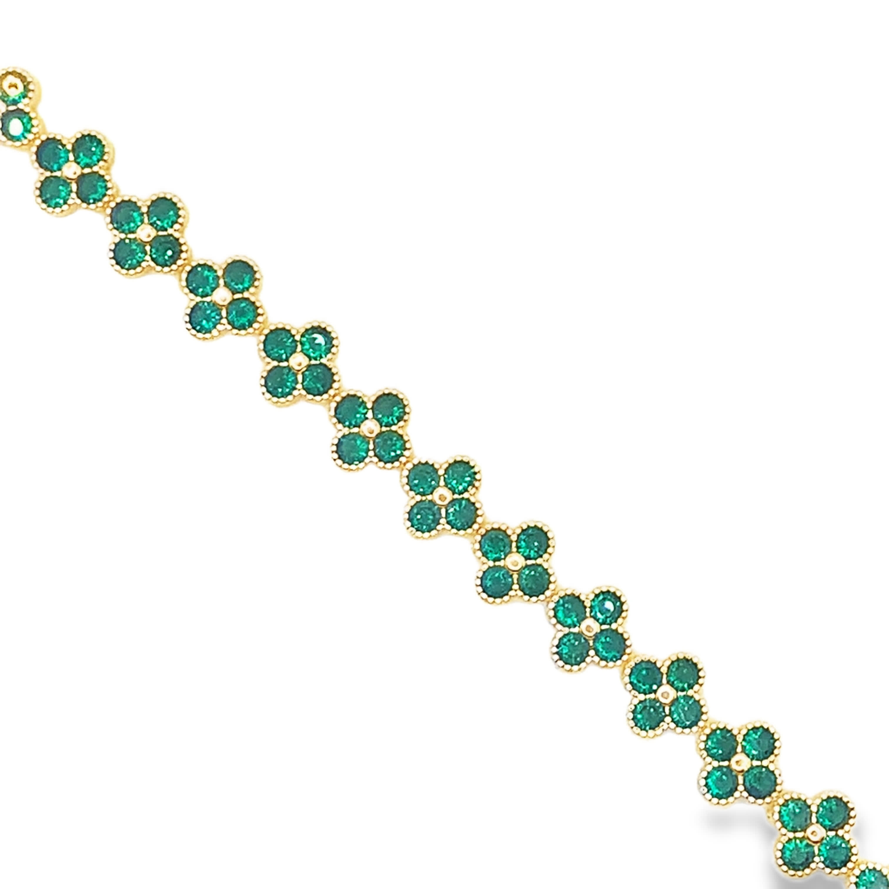 Bransoletka z żółtego złota z okrągłymi szmaragdami