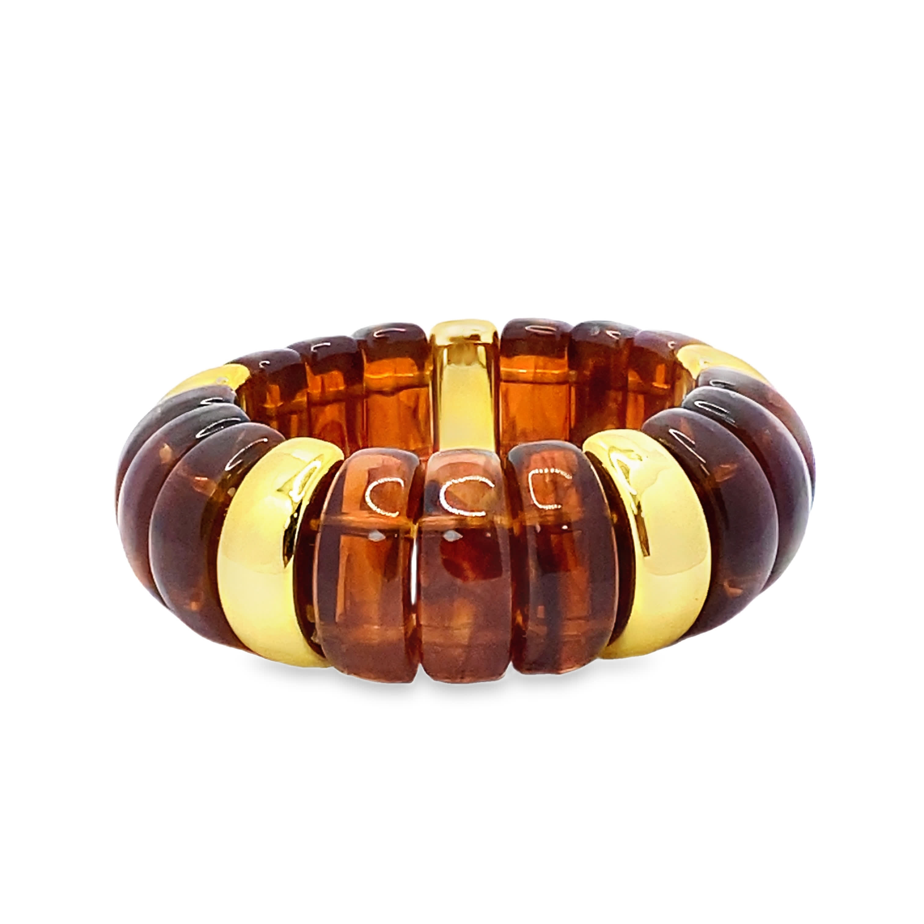 Bransoletka z koralików ze złoconej stali z okrągłymi kaboszonami bursztynowymi