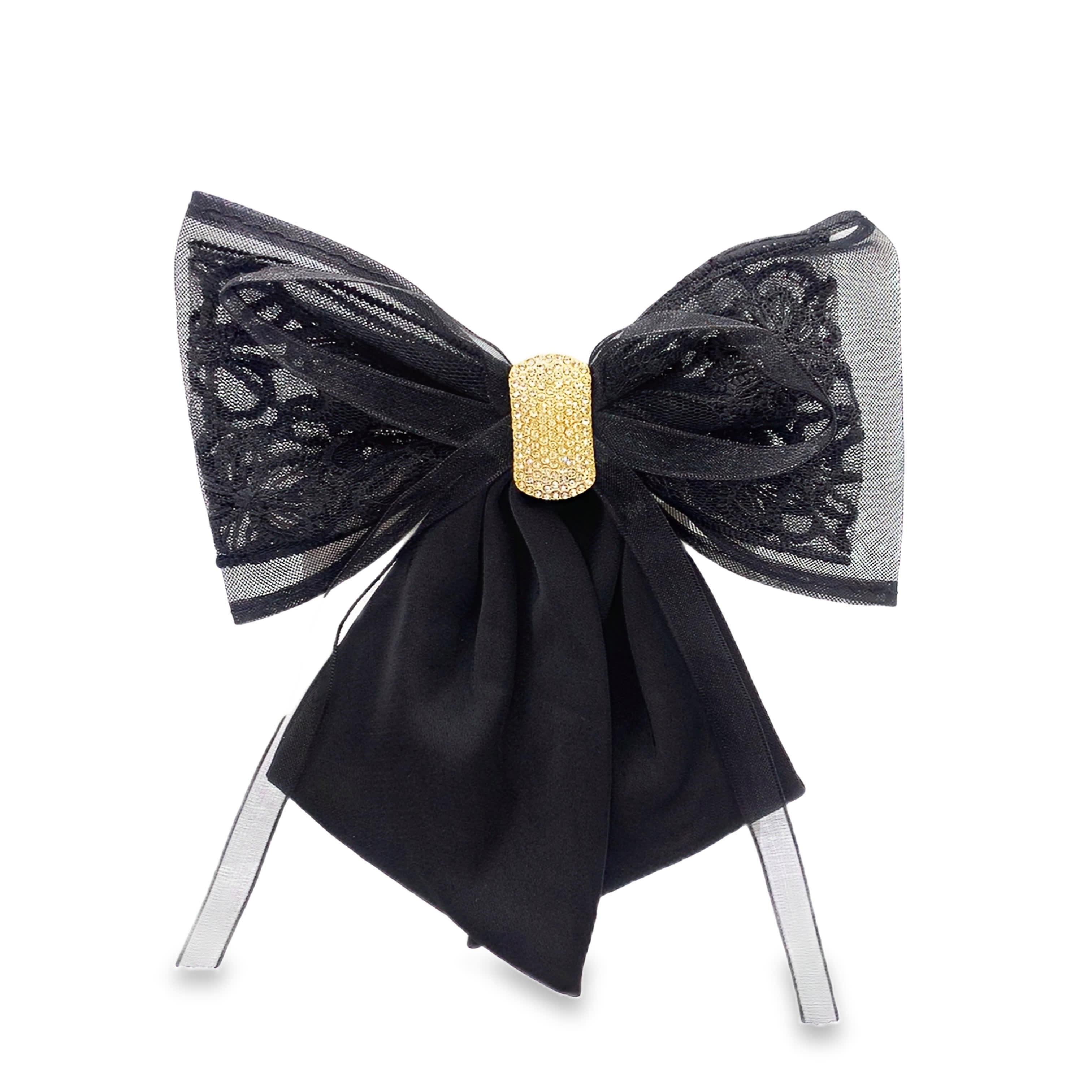 Broszka w kształcie kokardy z mieszanym metalem i akcentami w kolorze żółtego złota