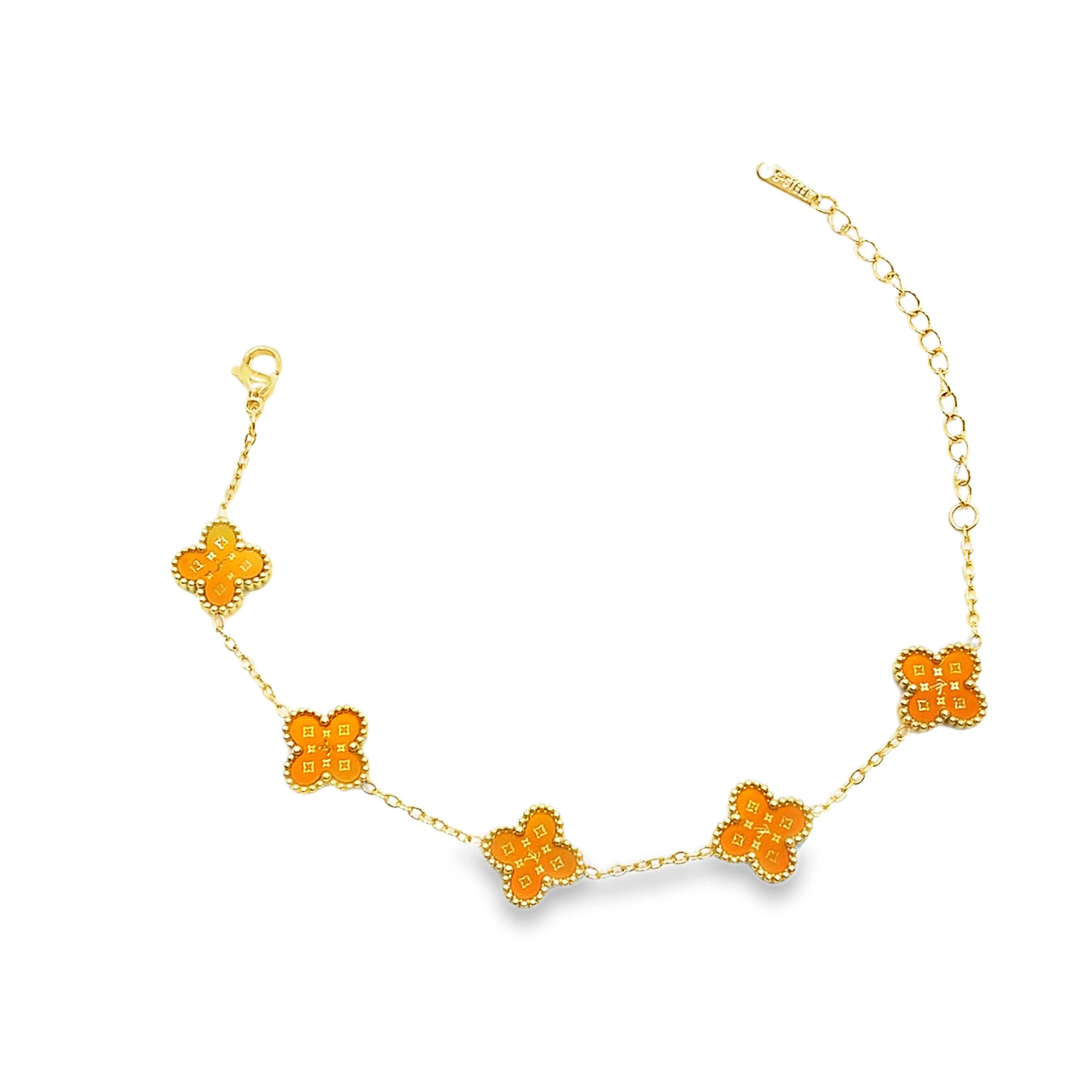 Elegancka bransoletka z żółtego złota z motywem koniczyny