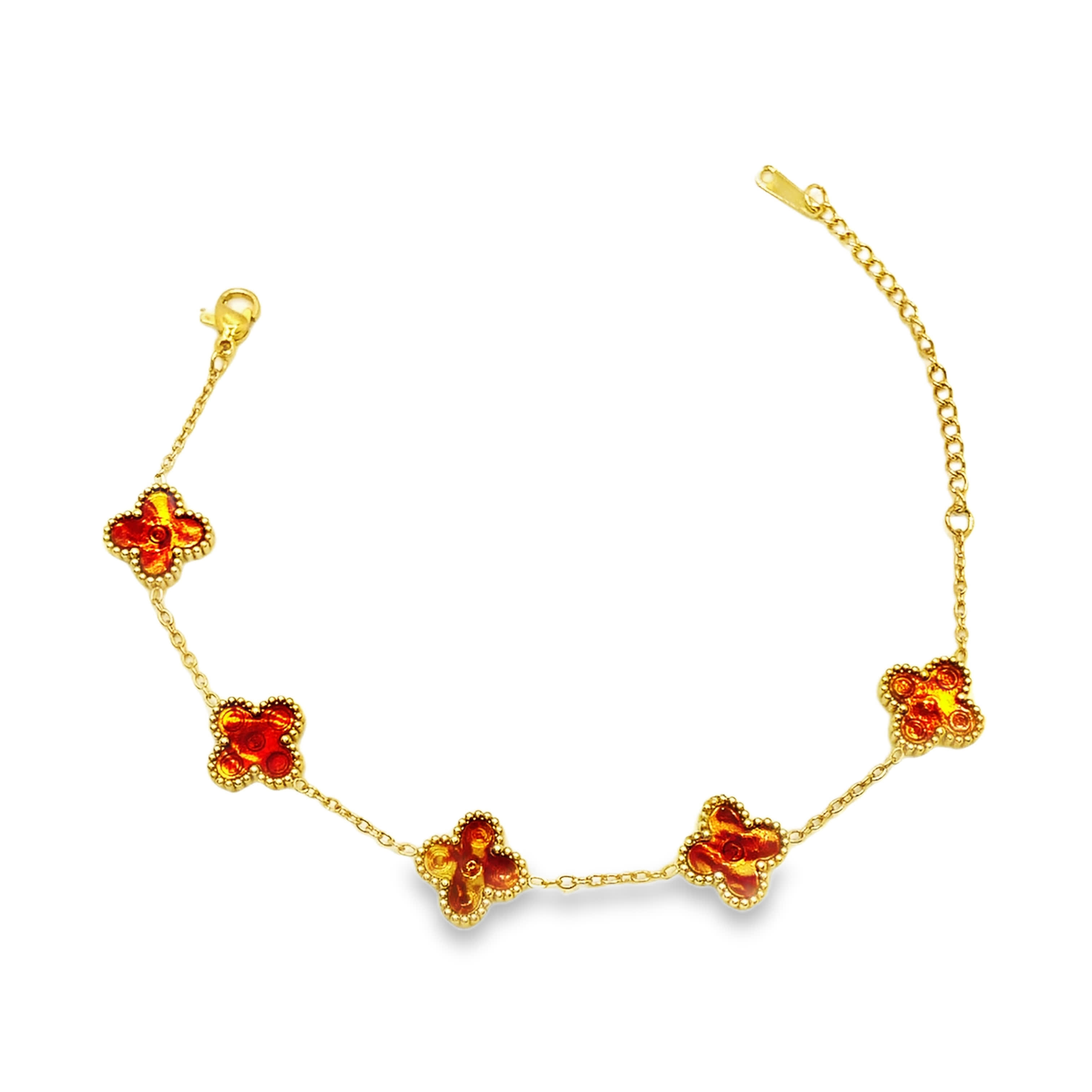 Delikatna bransoletka z żółtego złota z zawieszkami w kształcie czwórliści