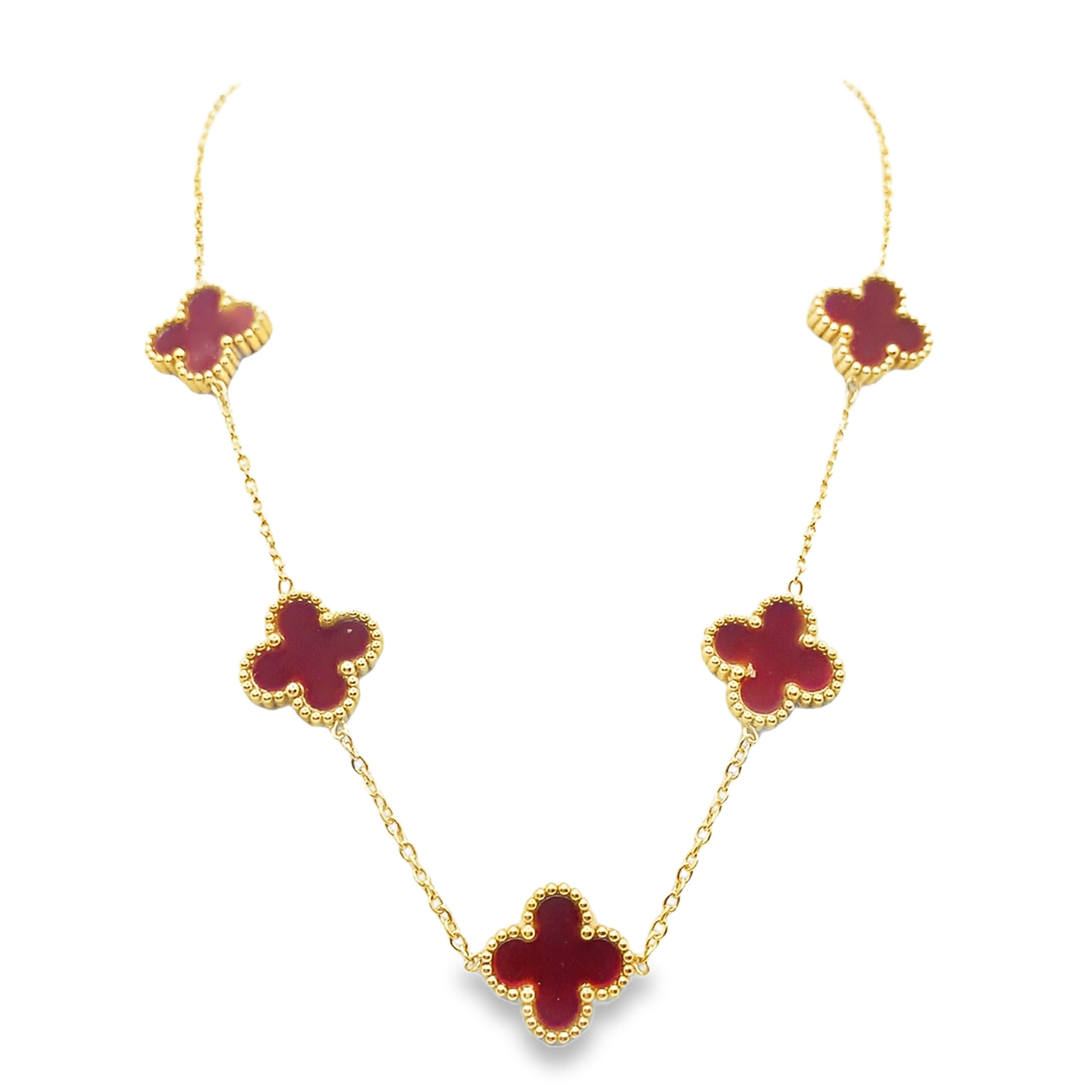 Naszyjnik z żółtego złota z zawieszkami w kształcie koniczyny w kolorze czerwonym i rubinem