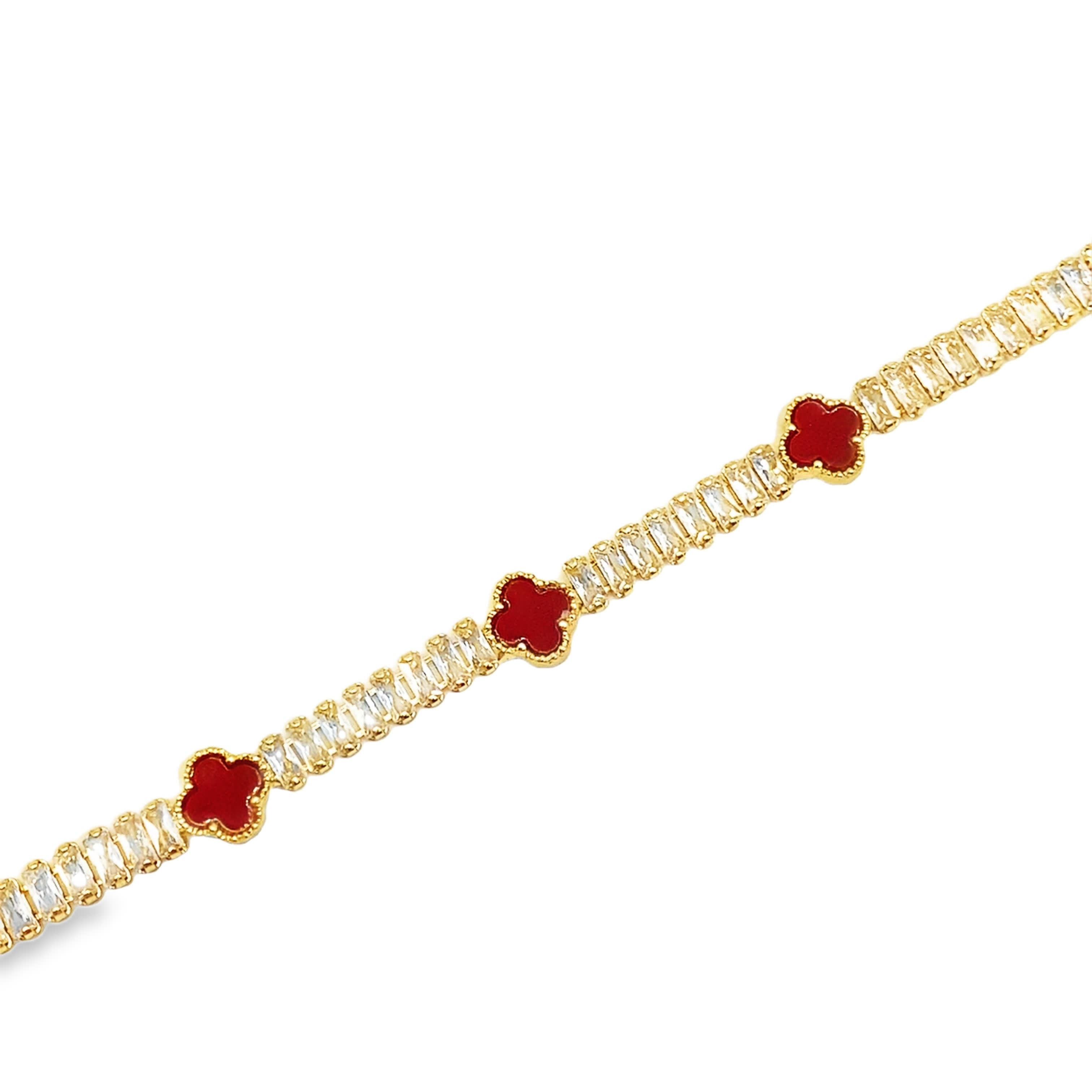 Bransoletka w kolorze żółtego złota z łańcuszkami i czerwonymi kryształowymi kaboszonami