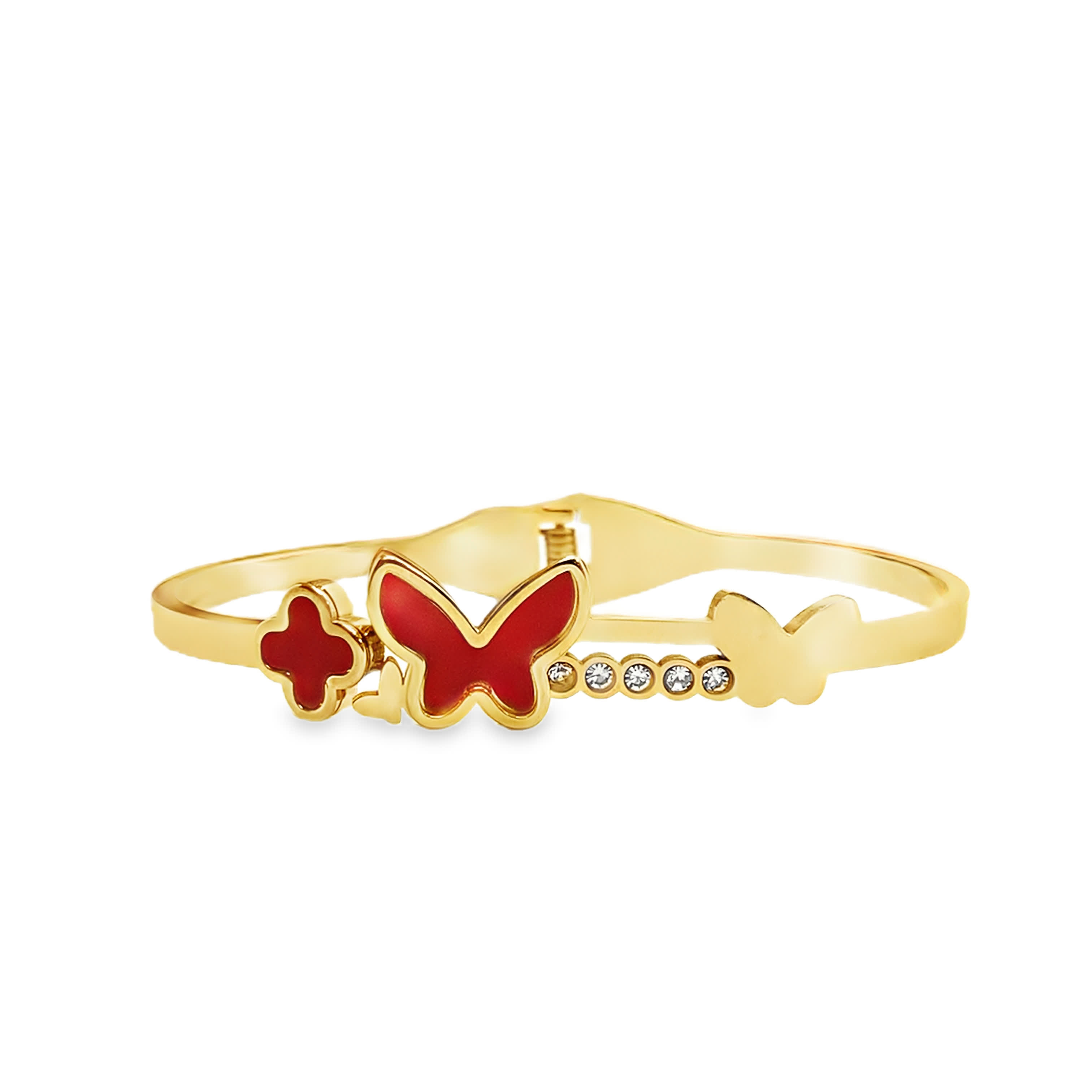 Bransoletka w kolorze żółtego złota z koniczyną, zawieszkami w kształcie motyli i kryształowymi akcentami