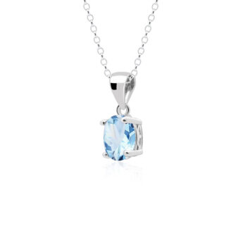 Zawieszka srebrna z niebieskim topazem w ażurowej oprawie